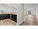 Kitchen area features dark cabinets with granite countertops and stainless steel appliances at 125 South Shore Blvd. # 201, Longs, SC 29568