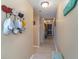 Hallway with tiled flooring and nautical-themed accents leading to other rooms at 1305 S Ocean Blvd. # 204, North Myrtle Beach, SC 29582