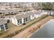 Aerial view of condos next to a body of water, offering beautiful waterfront views at 1356 Glenns Bay Rd. # 204D, Surfside Beach, SC 29575