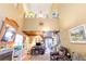 Living room view showcasing the lofted ceiling, built in shelving and stairs to the upper floor at 1356 Glenns Bay Rd. # 204D, Surfside Beach, SC 29575