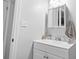 Bright bathroom with a white vanity, medicine cabinet, and modern fixtures at 1409 Highway 15 # 4, Myrtle Beach, SC 29577