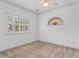 Neutral bedroom with natural light from two windows and a ceiling fan at 1529 Lanterns Rest Dr. # 201, Myrtle Beach, SC 29579