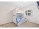 Bedroom featuring a bunk bed with ladder and a window with blinds at 1529 Lanterns Rest Dr. # 201, Myrtle Beach, SC 29579