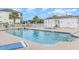 Community pool with adjacent hot tub and outdoor restroom facilities at 1529 Lanterns Rest Dr. # 201, Myrtle Beach, SC 29579