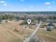 Aerial view of the property showcasing the home, surrounding land, and neighborhood at 1586 Bridgebrook Ln., Conway, SC 29527