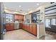 Kitchen featuring stainless steel appliances, granite countertops, tile backsplash, and view to living room at 1586 Bridgebrook Ln., Conway, SC 29527