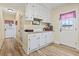 Well-organized mud room with ample cabinet storage and a convenient back door at 1586 Bridgebrook Ln., Conway, SC 29527