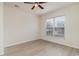 Bedroom with wood-look floors and natural light at 159 Chenoa Dr. # E, Murrells Inlet, SC 29576