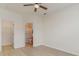 Bright bedroom with ceiling fan and access to bathroom at 159 Chenoa Dr. # E, Murrells Inlet, SC 29576