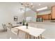 Open dining space with plenty of natural light, adjacent to the kitchen and living area at 159 Chenoa Dr. # E, Murrells Inlet, SC 29576