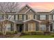 Attractive townhome featuring mixed brick and siding exterior and manicured landscaping at 159 Chenoa Dr. # E, Murrells Inlet, SC 29576