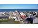 Aerial view of pier jutting out into the ocean surrounded by oceanfront community at 159 Hoffman Park Dr. # 79, Myrtle Beach, SC 29588