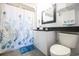 Well-lit bathroom with shower, updated vanity, and ocean-themed decor at 1604 N Ocean Blvd. # 605, Myrtle Beach, SC 29577