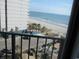 Beach view from the building including parking and a community pool at 1605 S Ocean Blvd. # 612, Myrtle Beach, SC 29577