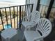 Relaxing balcony with seating overlooking the pool at 1605 S Ocean Blvd. # 612, Myrtle Beach, SC 29577