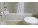 Standard white bathtub and toilet in the bathroom at 1605 S Ocean Blvd. # 612, Myrtle Beach, SC 29577