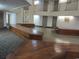 A multi-tiered lobby area featuring decorative wood benches and gray and cream carpet at 1605 S Ocean Blvd. # 612, Myrtle Beach, SC 29577