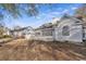 Spacious backyard featuring a white picket fence and well-maintained lawn at 1639 Coventry Rd., Surfside Beach, SC 29575