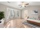 Bright bedroom featuring vaulted ceiling, bay windows, light walls, and hardwood-style flooring at 1639 Coventry Rd., Surfside Beach, SC 29575