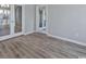 Bright dining room features gray walls, white trim, and light-colored flooring at 1639 Coventry Rd., Surfside Beach, SC 29575