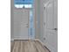 Welcoming foyer with stylish flooring and a modern front door design at 1639 Coventry Rd., Surfside Beach, SC 29575