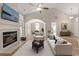 Spacious living room with fireplace and large windows providing ample light at 1639 Coventry Rd., Surfside Beach, SC 29575