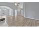 Open-concept living room featuring vaulted ceilings, neutral paint, and modern lighting at 1639 Coventry Rd., Surfside Beach, SC 29575