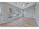 Bright living room with large windows providing natural light and a view of the surrounding landscape at 1639 Coventry Rd., Surfside Beach, SC 29575