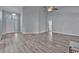 Inviting living room with sleek flooring and neutral walls, providing a versatile space for various design styles at 1639 Coventry Rd., Surfside Beach, SC 29575
