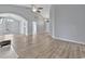 Spacious living room with vaulted ceilings, wood-look flooring, and an open layout perfect for entertaining at 1639 Coventry Rd., Surfside Beach, SC 29575