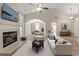 Spacious living room featuring a fireplace, modern furniture, and open access to the dining area at 1639 Coventry Rd., Surfside Beach, SC 29575