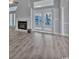 Cozy living space featuring a fireplace, neutral color palette, and modern flooring, creating a comfortable ambiance at 1639 Coventry Rd., Surfside Beach, SC 29575