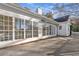 Spacious outdoor patio with large windows and brick accents at 1639 Coventry Rd., Surfside Beach, SC 29575