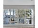 Bright room featuring a wall of windows overlooking an outdoor space at 1639 Coventry Rd., Surfside Beach, SC 29575