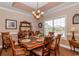 Formal dining room with traditional furnishings offers a wonderful space for Gathering gatherings and entertaining at 1796 Fairwinds Dr., Longs, SC 29568