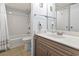 Well-lit bathroom featuring a shower-tub combo and a light vanity with ample counter space at 180 Rothbury Circle # 303, Myrtle Beach, SC 29572