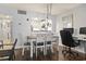 Bright dining area flows into the kitchen; features hardwood floors at 180 Rothbury Circle # 303, Myrtle Beach, SC 29572