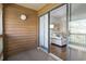 Enclosed patio with sliding glass doors that look into the living room at 180 Rothbury Circle # 303, Myrtle Beach, SC 29572