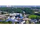 Scenic aerial view of a coastal community featuring a marina, waterway, and lush greenery at 1808 Sunshine Ct., North Myrtle Beach, SC 29582