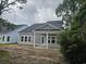 Elegant home with a covered back porch and a freshly landscaped yard at 1808 Sunshine Ct., North Myrtle Beach, SC 29582
