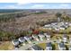 Aerial view of the neighborhood with natural backdrop, showcasing the home and surroundings at 188 Timber Oaks Dr., Myrtle Beach, SC 29588