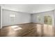 Spacious living room featuring hardwood floors, neutral paint and natural light at 188 Timber Oaks Dr., Myrtle Beach, SC 29588