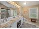 Bathroom featuring double sinks, granite counters, and a glass-enclosed shower at 2264 Wedgefield Rd., Georgetown, SC 29440