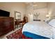 Well-lit bedroom with elegant decor, vaulted ceiling, and plush carpeting at 2264 Wedgefield Rd., Georgetown, SC 29440