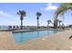 A brick lined outdoor pool with lounge chairs with a view of the ocean at 2311 S Ocean Blvd. # 969, Myrtle Beach, SC 29577