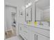 Bathroom features dual sinks with white countertops and modern fixtures at 2341 Hazel Way, Longs, SC 29568