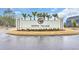 Welcome to North Village, a charming community with a beautifully landscaped entrance and palm trees at 2341 Hazel Way, Longs, SC 29568