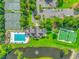 An aerial view of the community pool, tennis courts and pond at 25 Berwick Dr., Pawleys Island, SC 29585