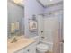 Well-lit bathroom featuring a shower-tub combo and a sink at 25 Berwick Dr., Pawleys Island, SC 29585