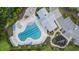 Aerial view of a community pool and amenity center with lush landscaping and parking at 2568 Goldfinch Dr., Myrtle Beach, SC 29577